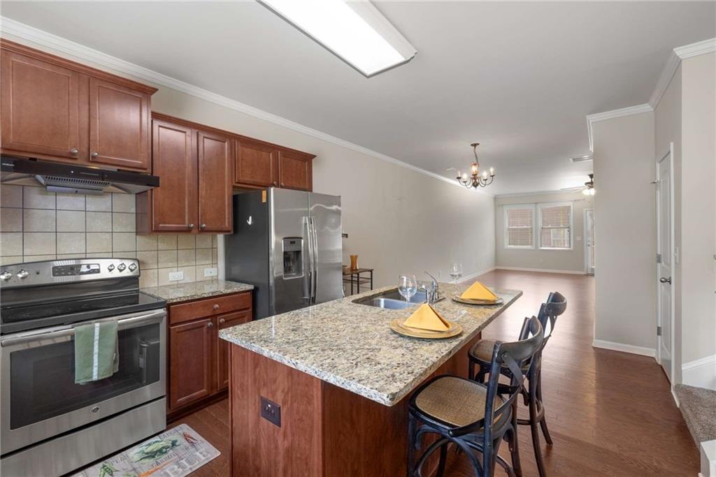 3084 Turman Circle Decatur, GA 30033 - Photo 8 of 36 a kitchen that has a table and chairs in it