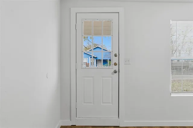 a view of hallway with closet