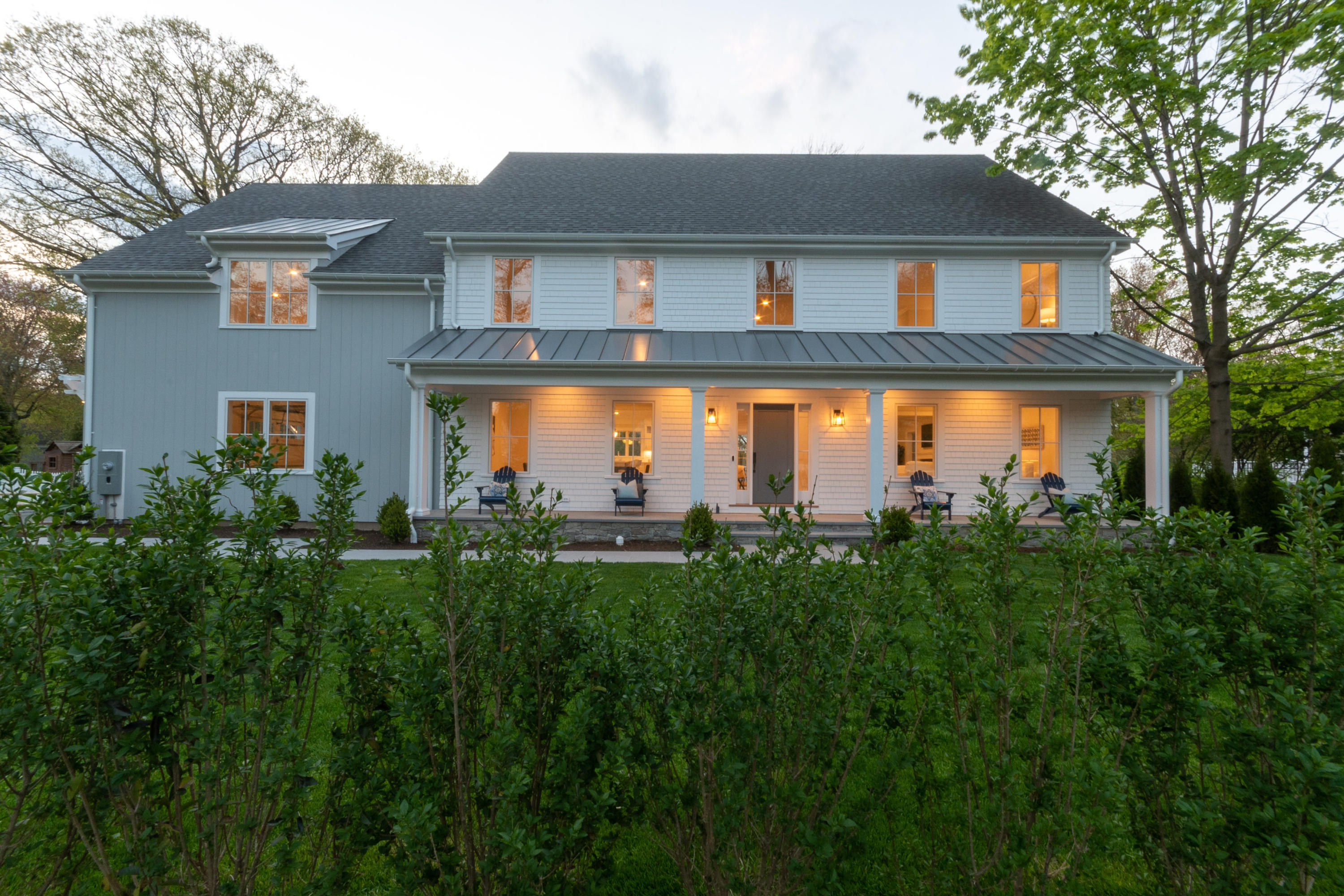 113 Hollow Tree Ridge Road Darien, CT 06820 - Photo 1 of 48 a front view of house with yard and green space