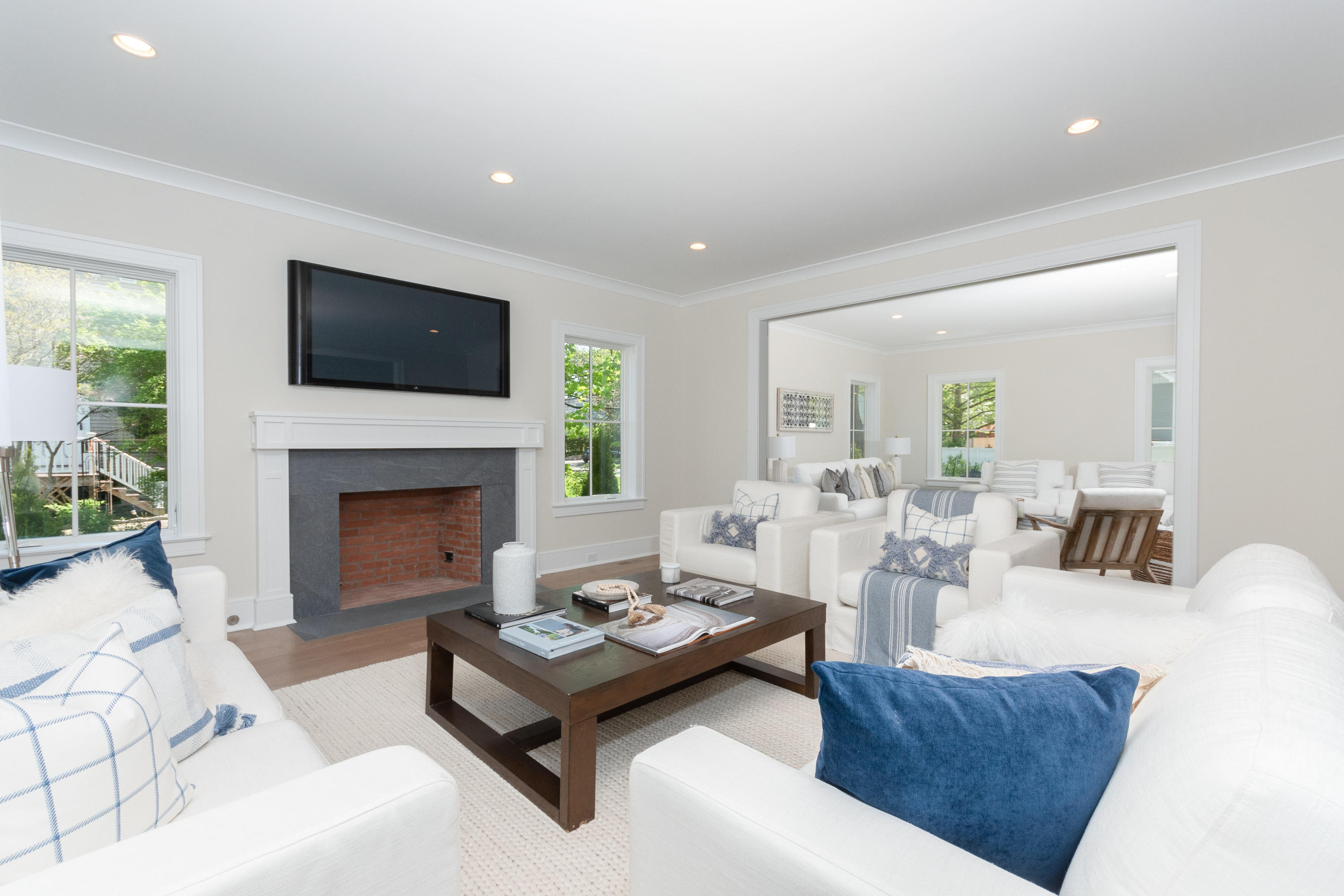 113 Hollow Tree Ridge Road Darien, CT 06820 - Photo 18 of 48 a living room with furniture fireplace and window