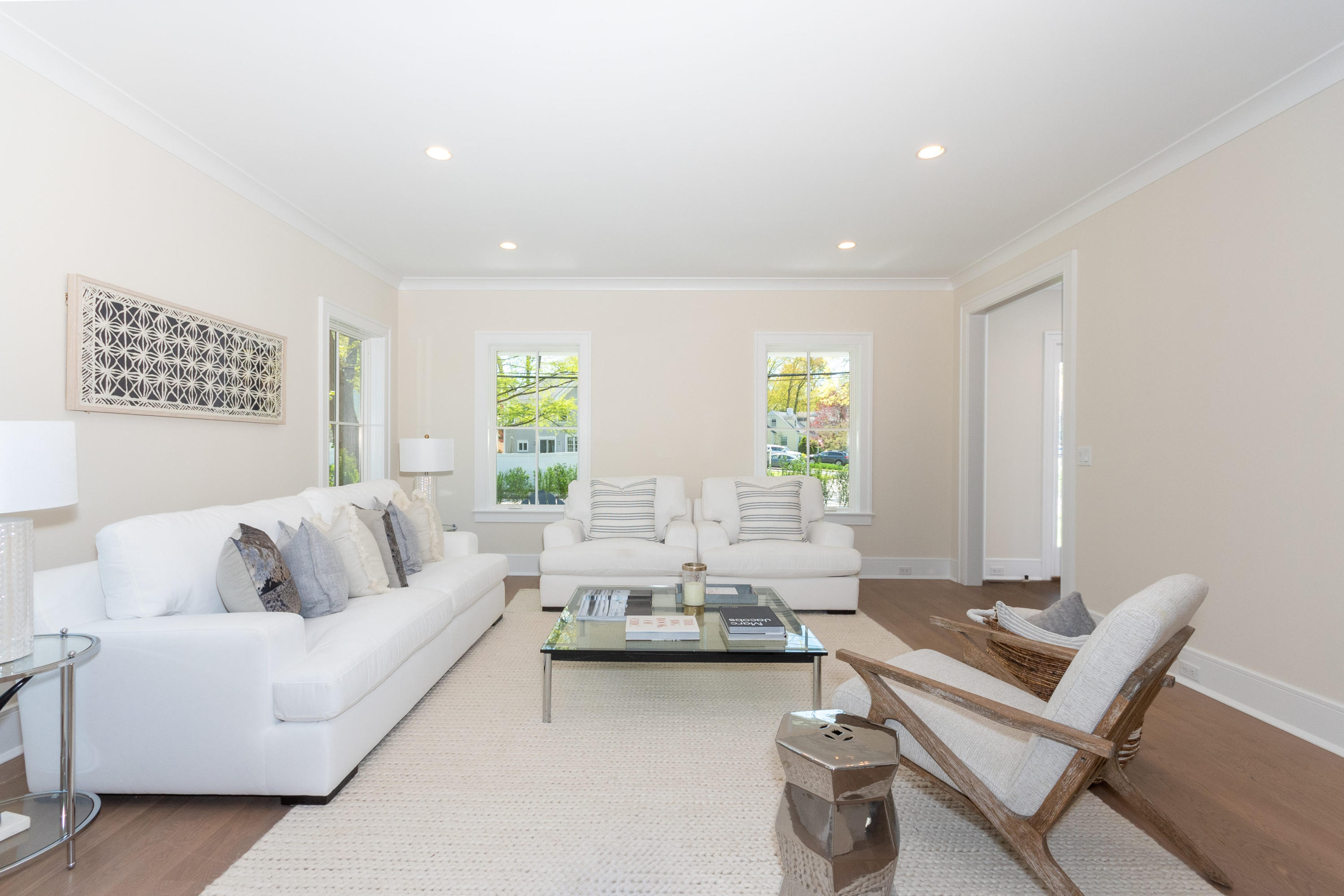 113 Hollow Tree Ridge Road Darien, CT 06820 - Photo 20 of 48 a living room with furniture and a large window