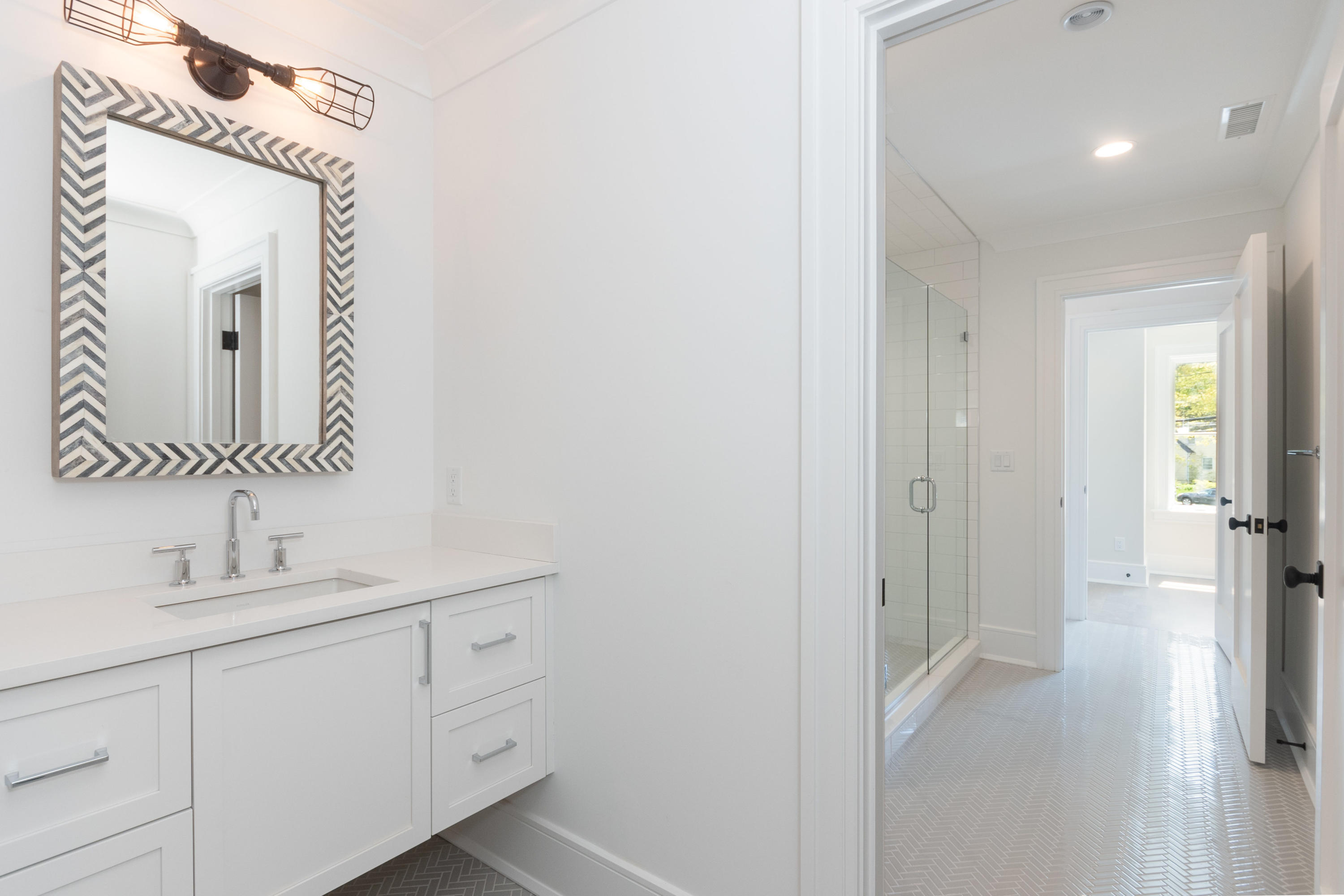 113 Hollow Tree Ridge Road Darien, CT 06820 - Photo 31 of 48 a en suite bathroom with a sink and a mirror