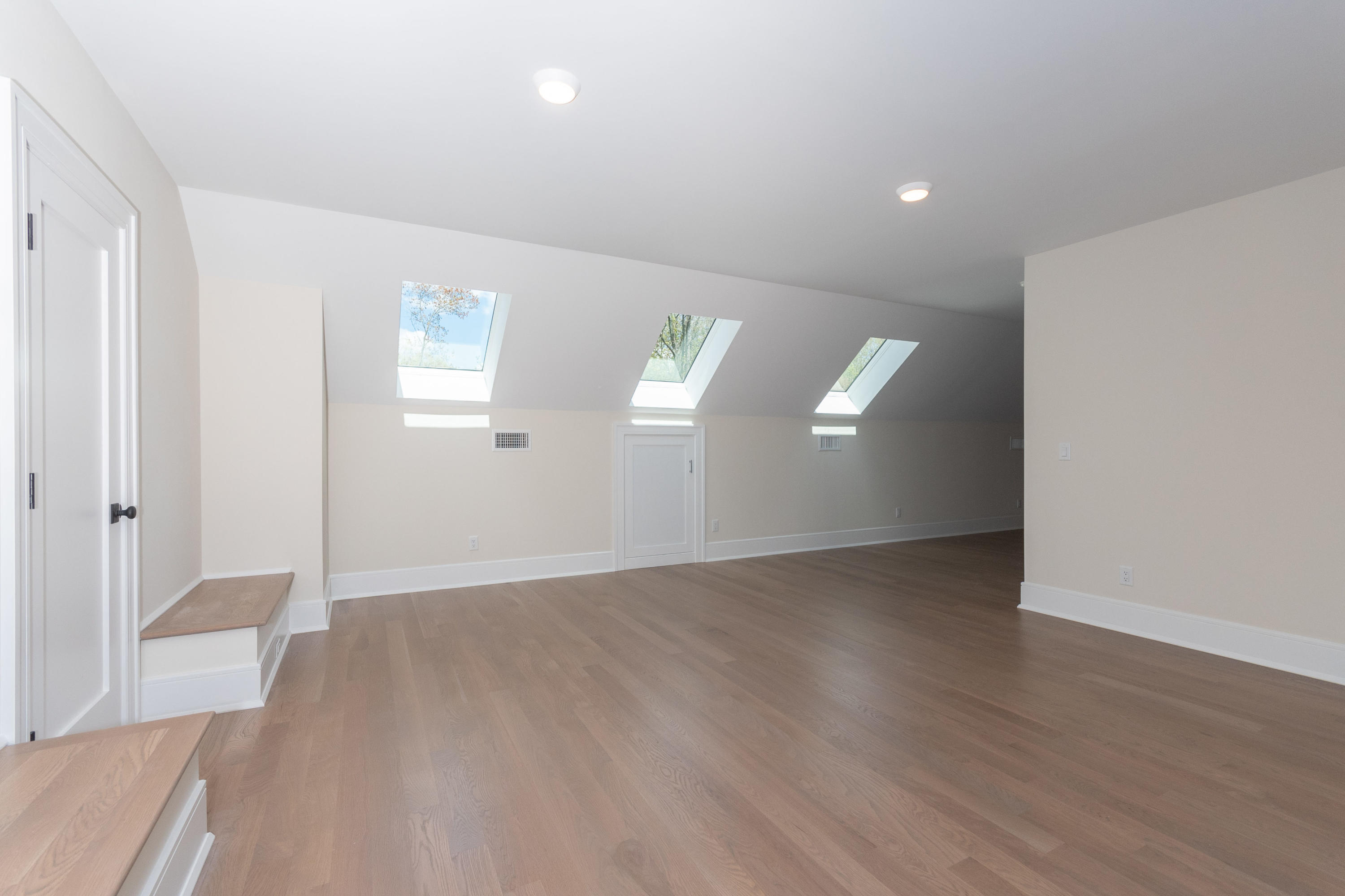 113 Hollow Tree Ridge Road Darien, CT 06820 - Photo 36 of 48 wooden floor in an empty room with a window