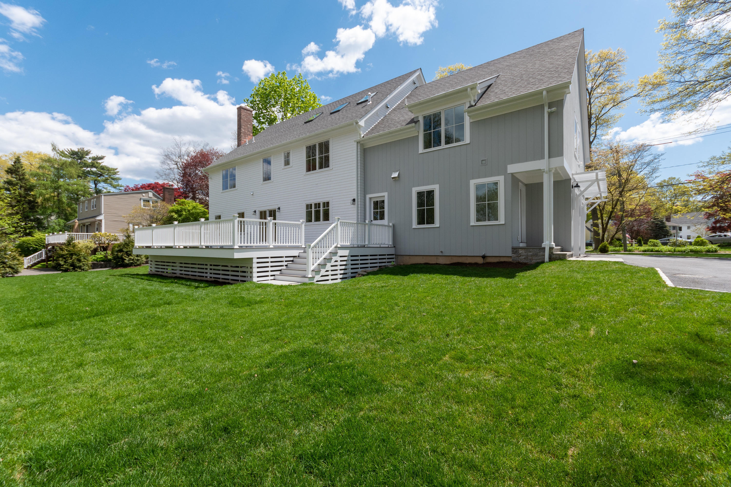 113 Hollow Tree Ridge Road Darien, CT 06820 - Photo 41 of 48 a front view of house with yard and entertaining space