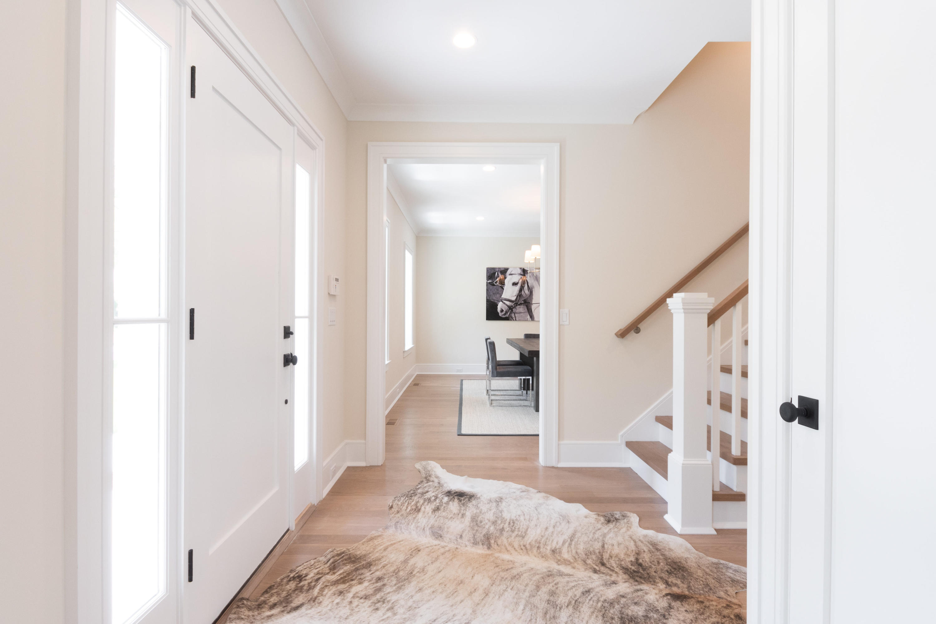 113 Hollow Tree Ridge Road Darien, CT 06820 - Photo 7 of 48 a view of a bedroom with wooden floor and windows