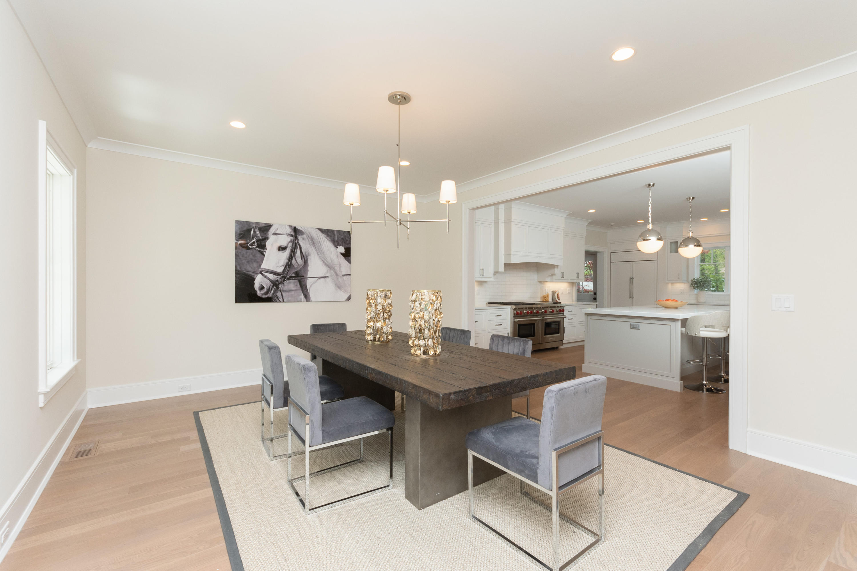 113 Hollow Tree Ridge Road Darien, CT 06820 - Photo 9 of 48 a kitchen with a table and chairs in it