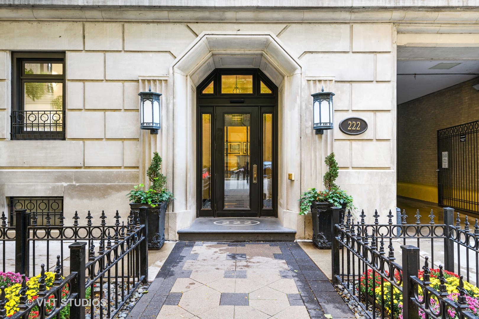 222 East Chestnut Street, Unit 8A Chicago, IL 60611 - Photo 2 of 41 a front view of a house with a porch