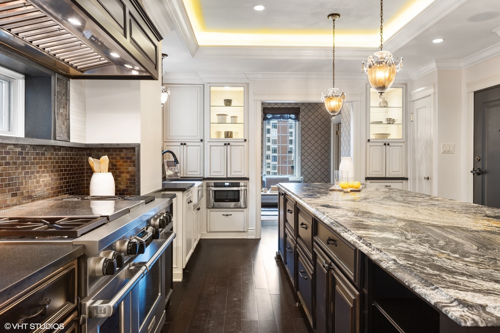 222 East Chestnut Street, Unit 8A Chicago, IL 60611 - Photo 11 of 41 a kitchen with a stove and a sink
