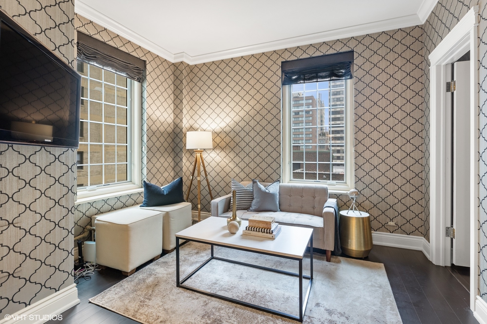 222 East Chestnut Street, Unit 8A Chicago, IL 60611 - Photo 13 of 41 a outdoor living space with furniture and a flat screen tv