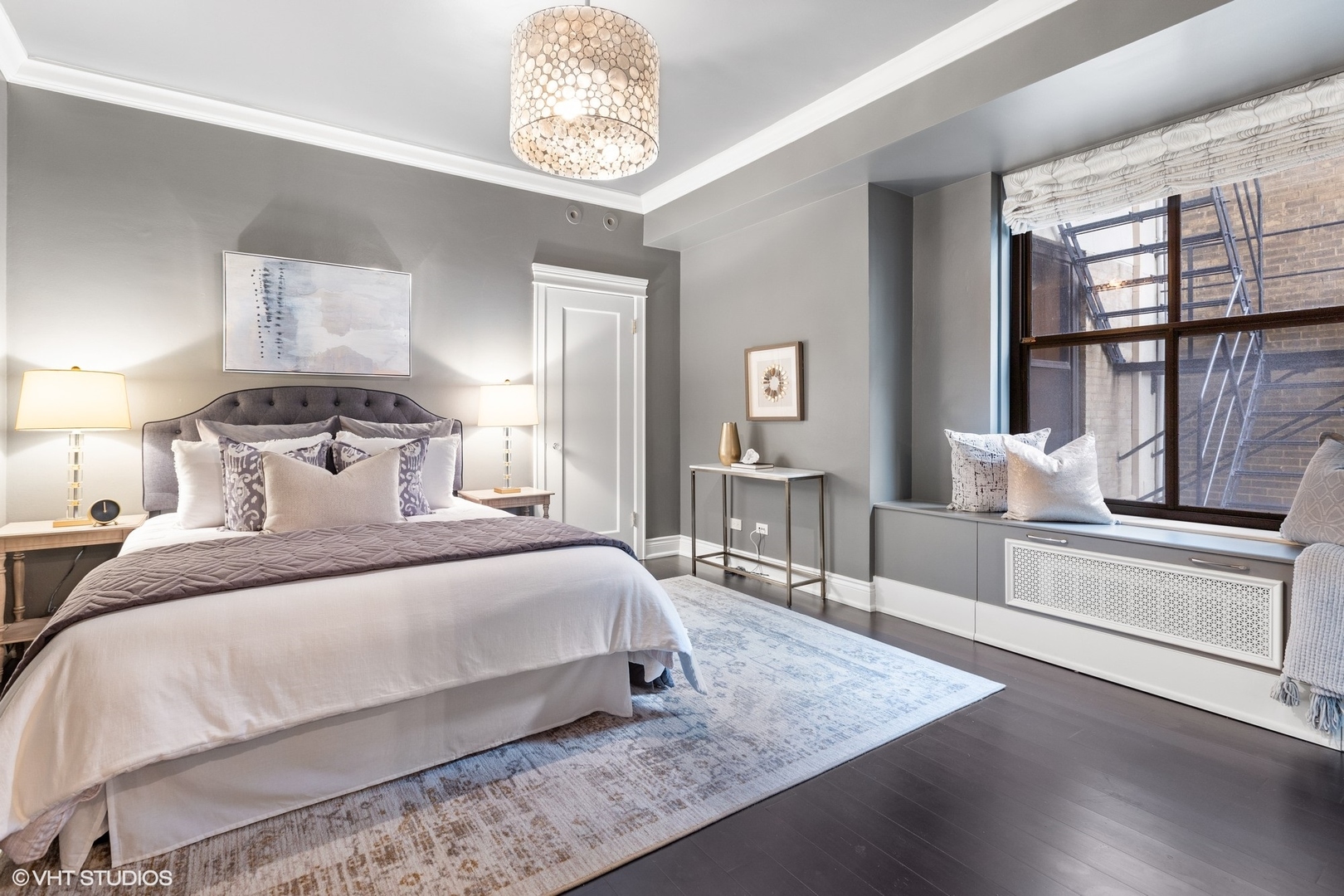 222 East Chestnut Street, Unit 8A Chicago, IL 60611 - Photo 22 of 41 a bedroom with a large bed and a table