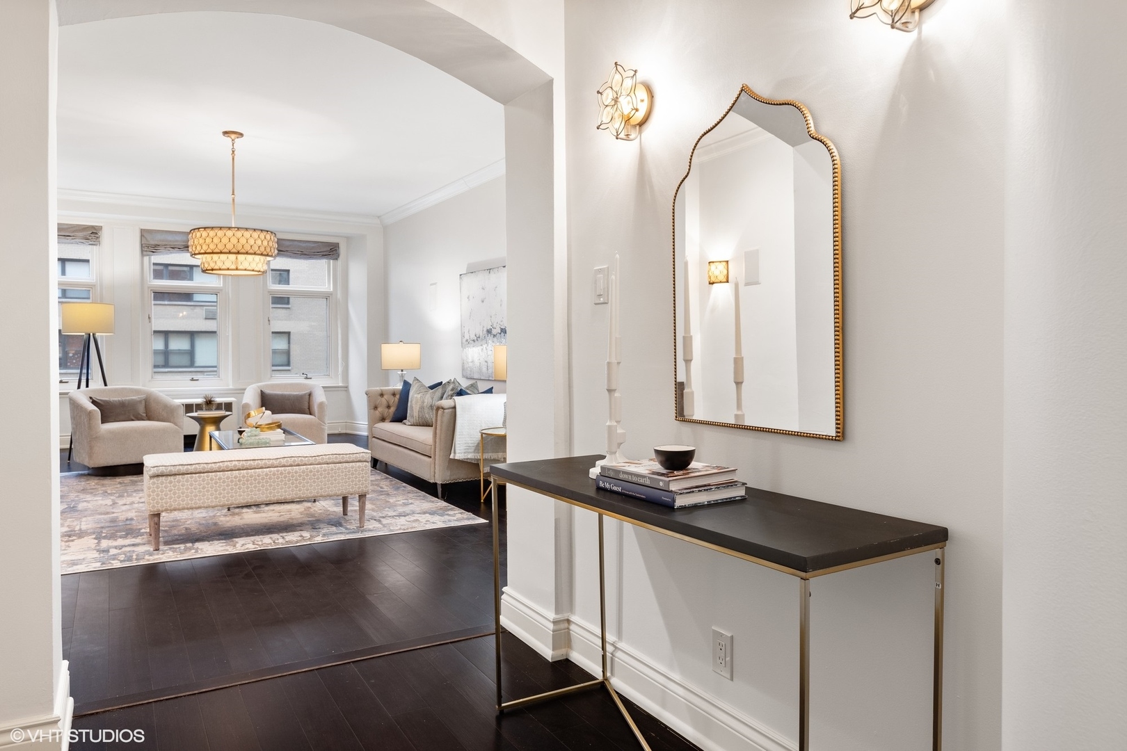 222 East Chestnut Street, Unit 8A Chicago, IL 60611 - Photo 5 of 41 a living room with granite countertop furniture and a fireplace
