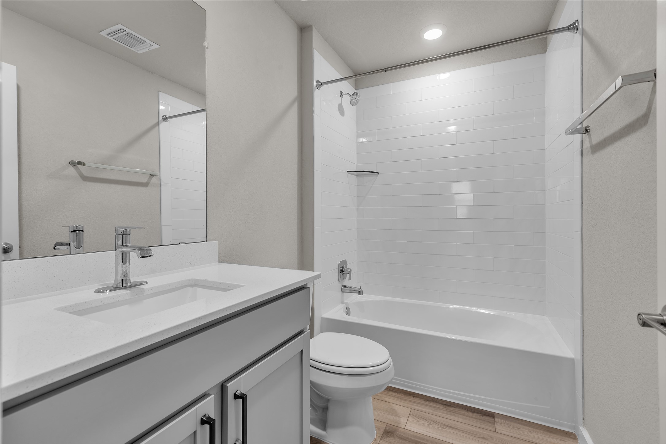 1212 Tipton Street Georgetown, TX 78633 - Photo 16 of 20 A well-appointed bath features a sleek vanity, modern fixtures, and a clean tub-shower combination.