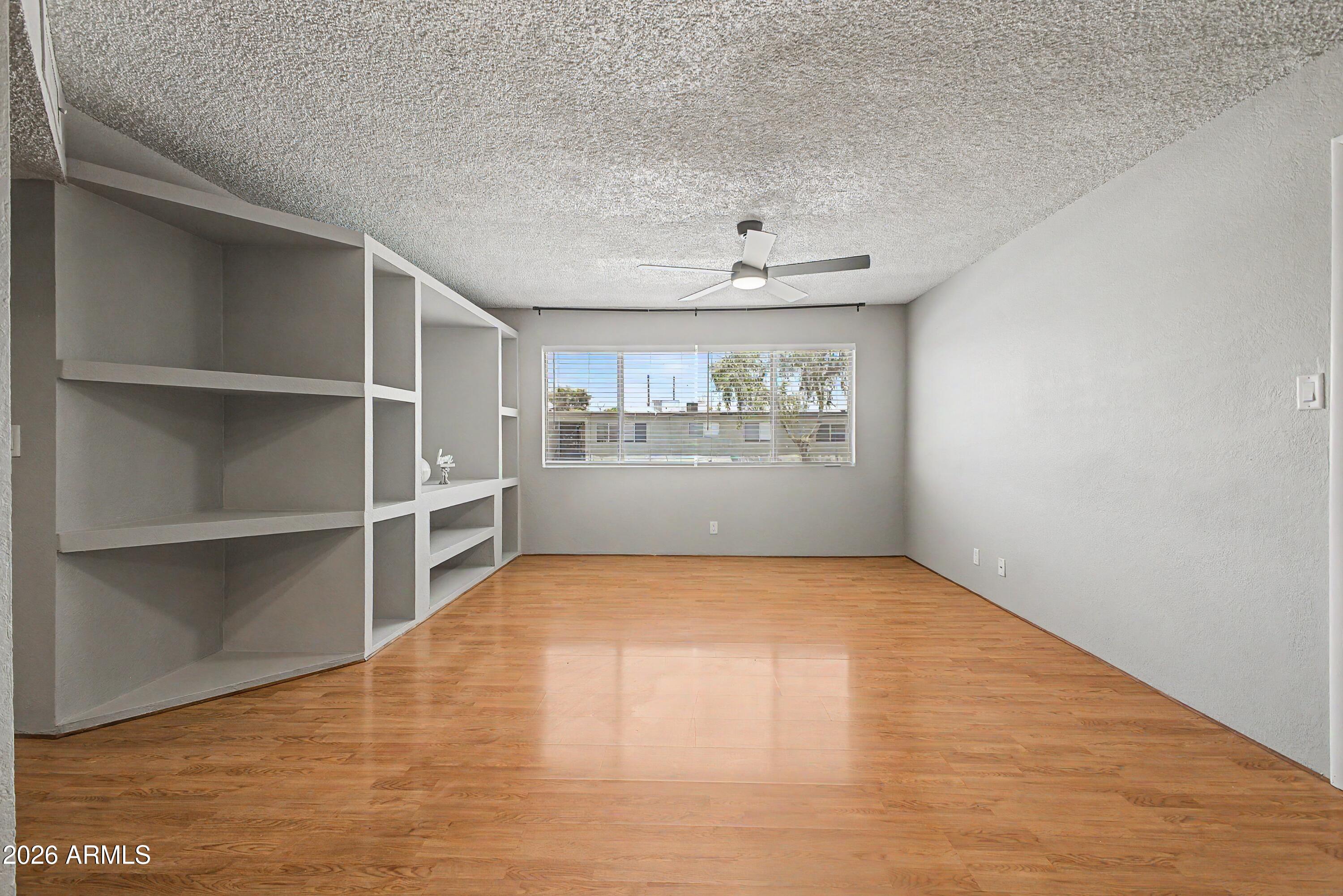 424 West Brown Road, Unit 248 Mesa, AZ 85201 - Photo 2 of 19 a view of an empty room with a window