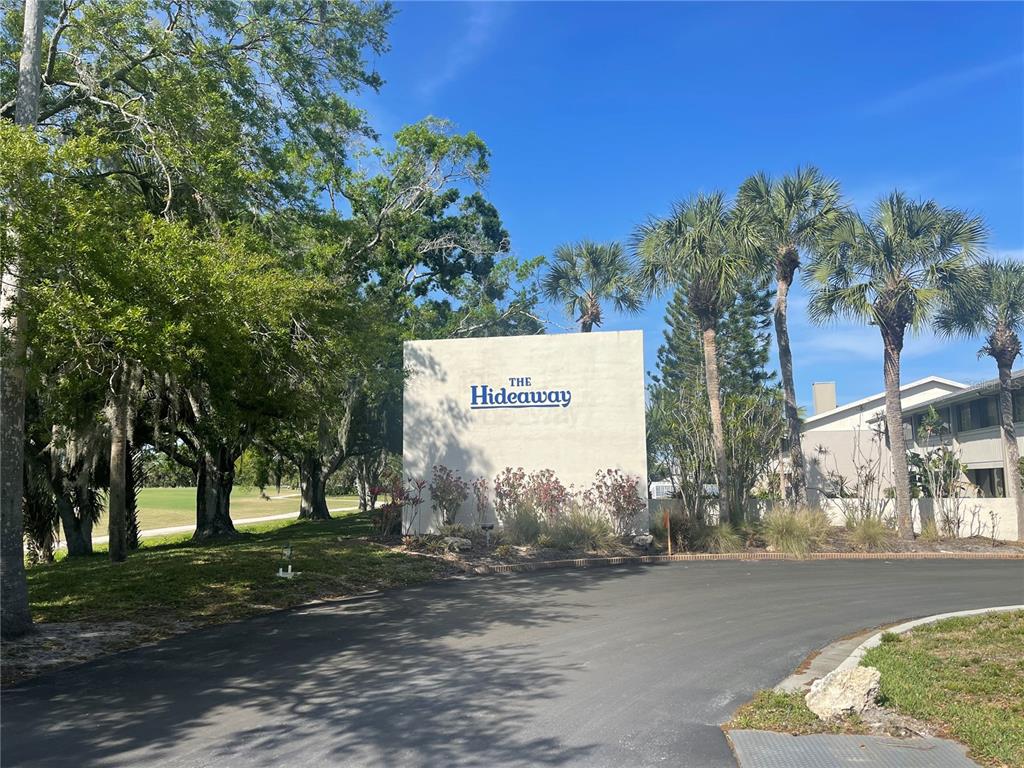 335 Bobby Jones Road, Unit 335 Sarasota, FL 34232 - Photo 13 of 16 a view of a street with a building in the background