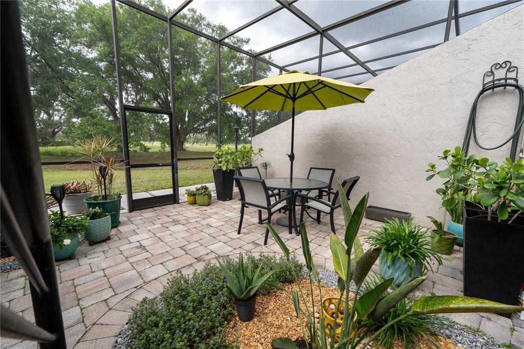 335 Bobby Jones Road, Unit 335 Sarasota, FL 34232 - Photo 3 of 16 a view of yard with patio