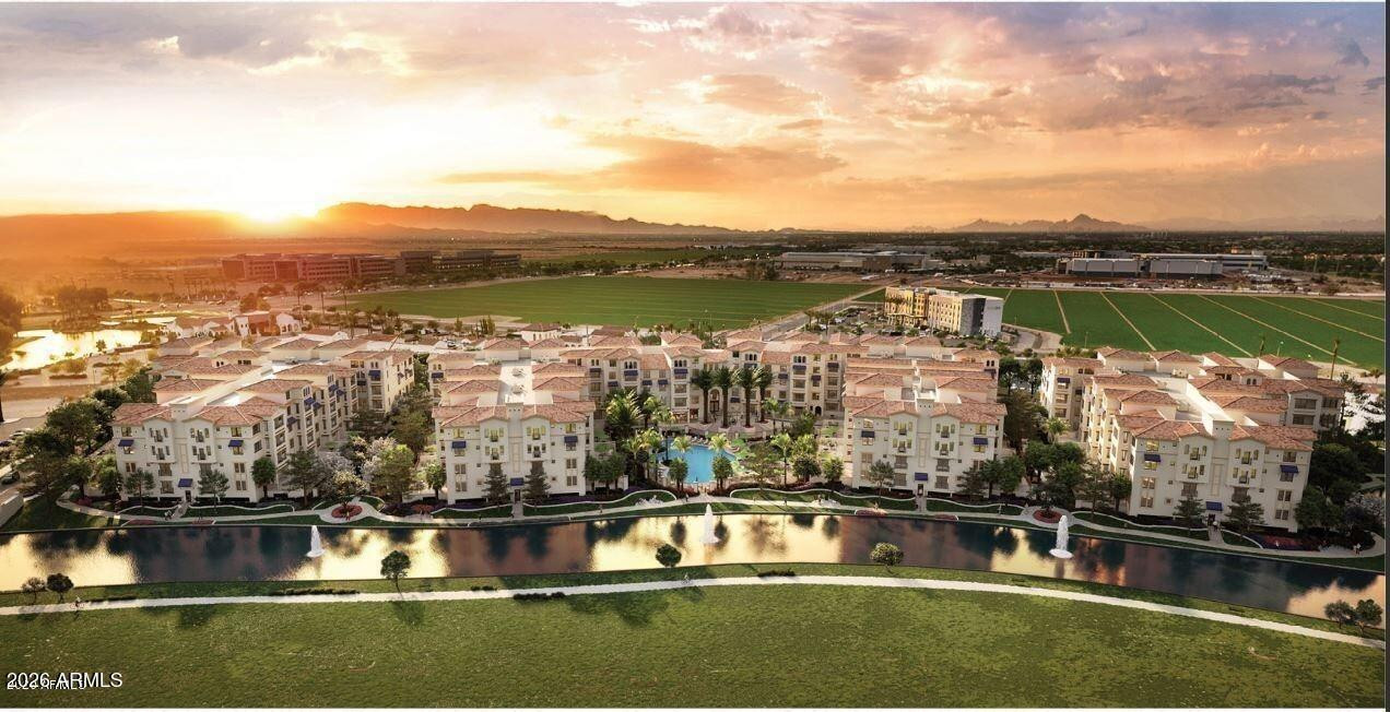 2511 West Queen Creek Road, Unit 438 Chandler, AZ 85248 - Photo 23 of 23 an aerial view of a house with a lake view