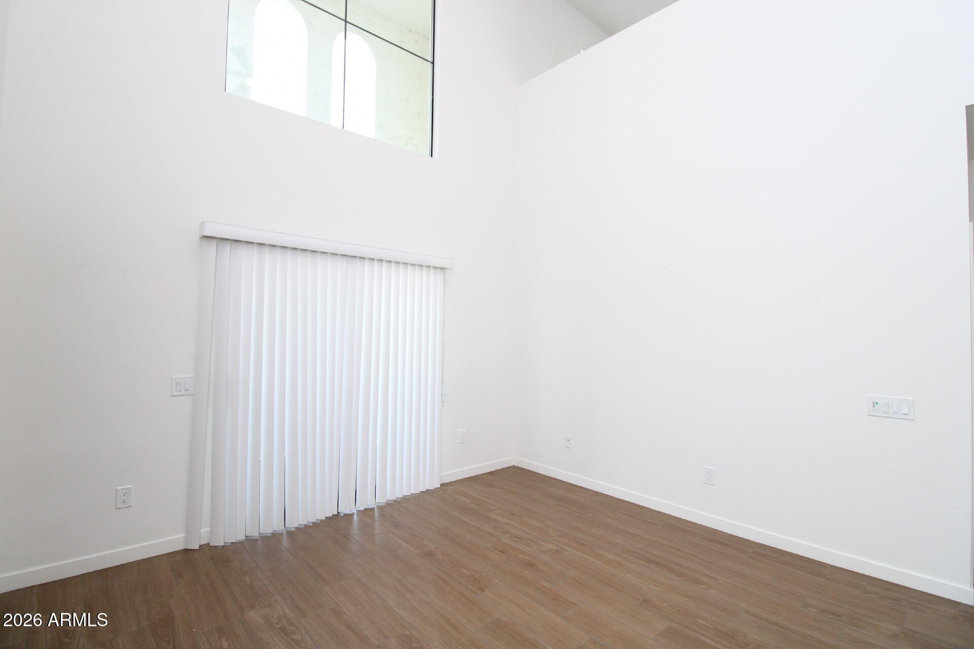 2511 West Queen Creek Road, Unit 438 Chandler, AZ 85248 - Photo 4 of 23 a view of an empty room