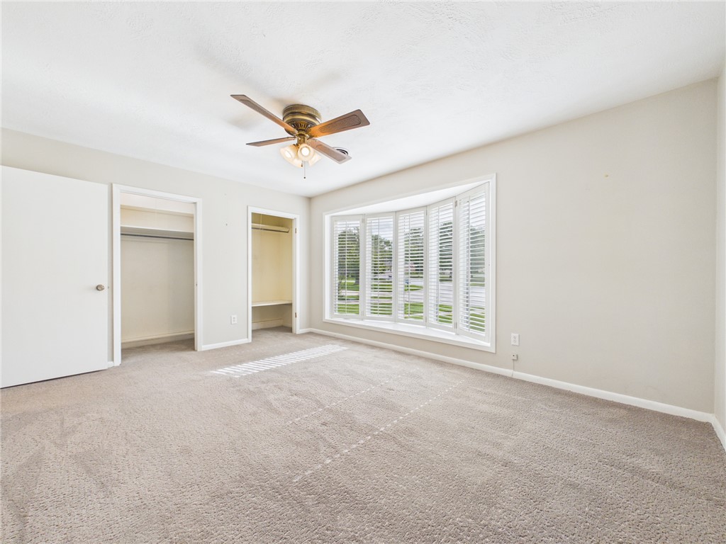 902 Briar Bend Court Bryan, TX 77802 - Photo 16 of 39 a view of an empty room with a window