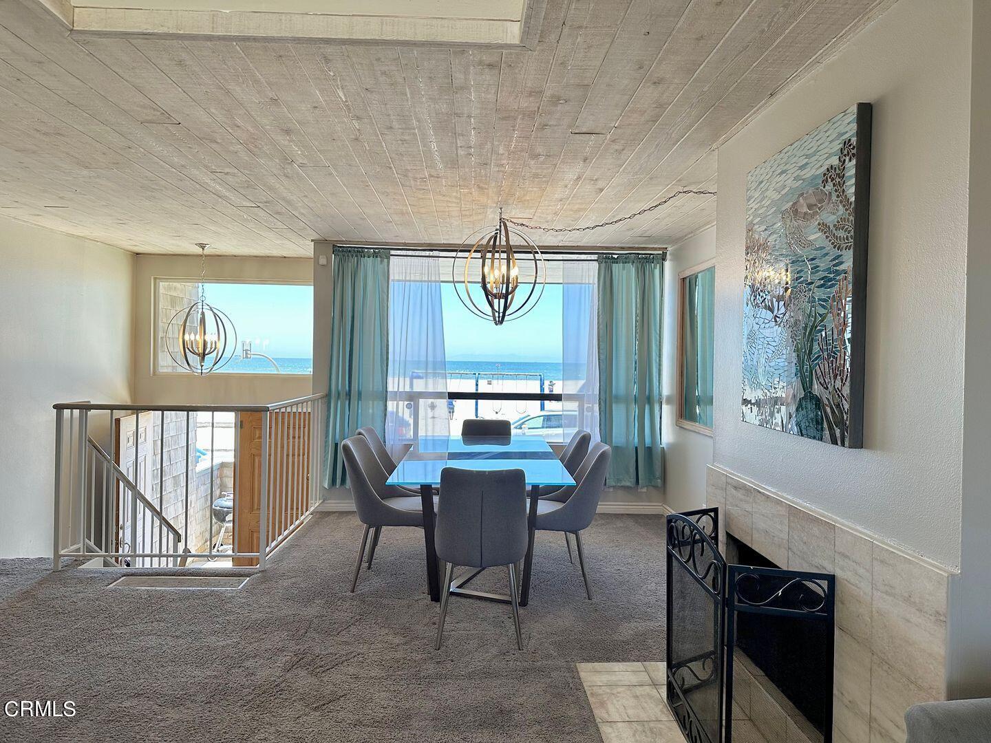 1364 Neptune Square Oxnard, CA 93035 - Photo 12 of 42 a view of a dining room with furniture window and outside view