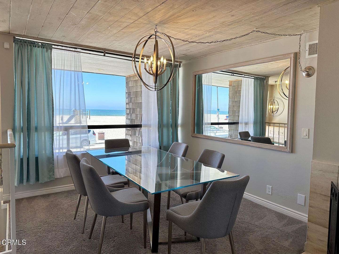 1364 Neptune Square Oxnard, CA 93035 - Photo 13 of 42 a view of a dining room with furniture window and outside view