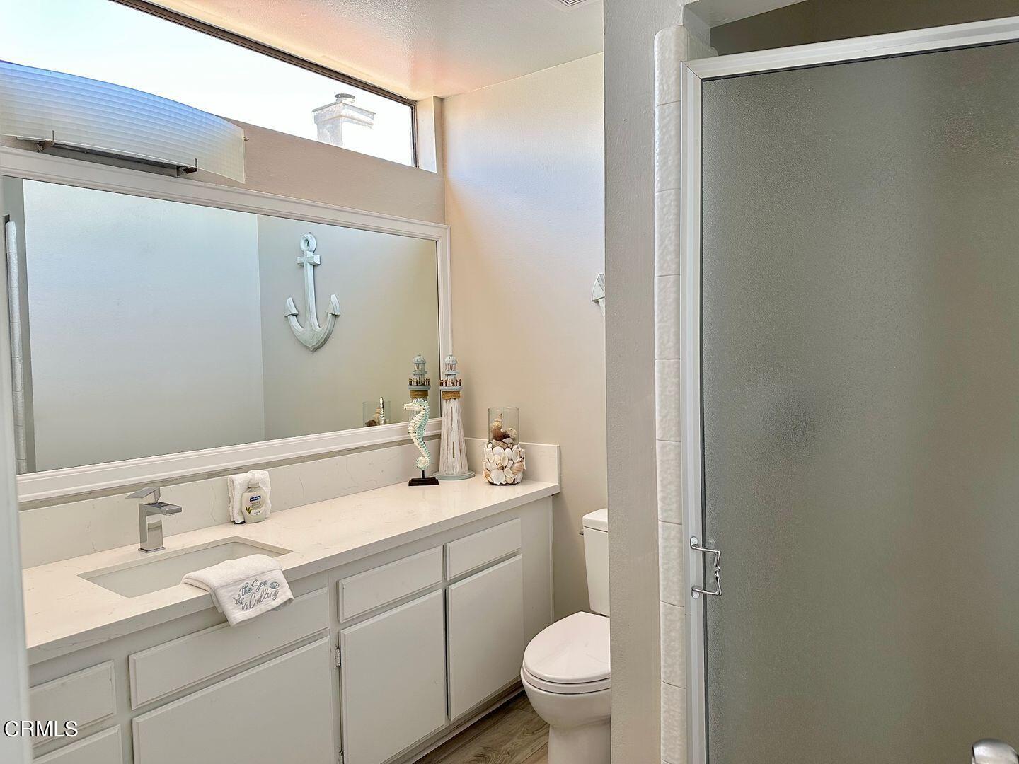 1364 Neptune Square Oxnard, CA 93035 - Photo 33 of 42 a bathroom with a sink and a toilet
