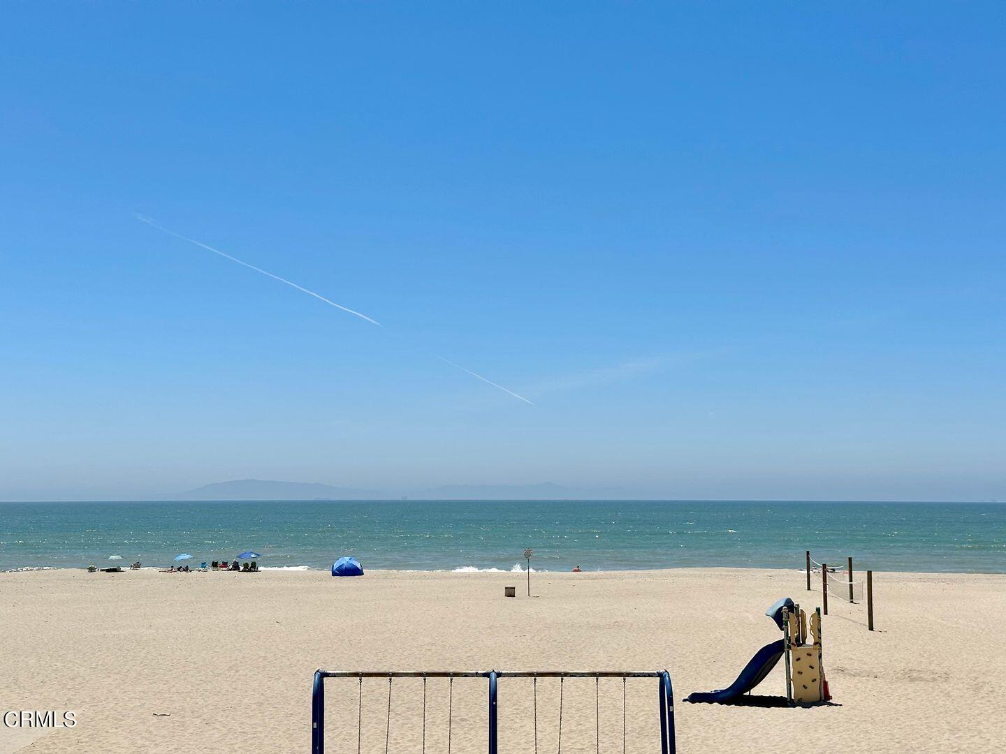 1364 Neptune Square Oxnard, CA 93035 - Photo 37 of 42 a view of a swimming pool and an outdoor seating