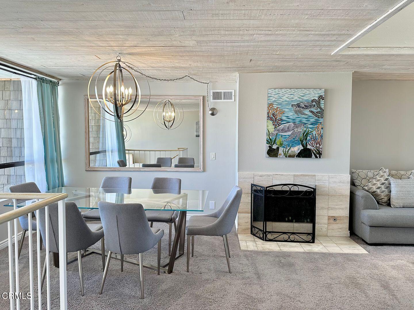 1364 Neptune Square Oxnard, CA 93035 - Photo 8 of 42 a view of a livingroom with furniture and a fireplace