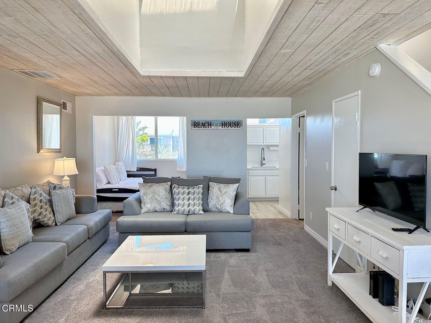 1364 Neptune Square Oxnard, CA 93035 - Photo 10 of 42 a living room with furniture and a fireplace