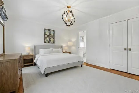 a bathroom with a sink a mirror and a shower