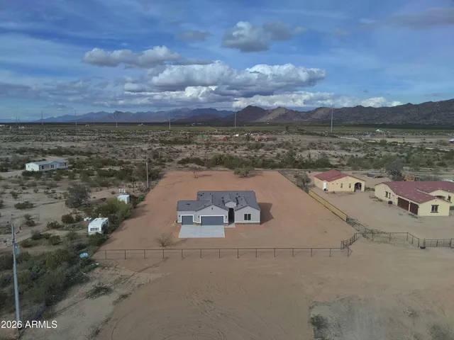 a view of a house with a mountain