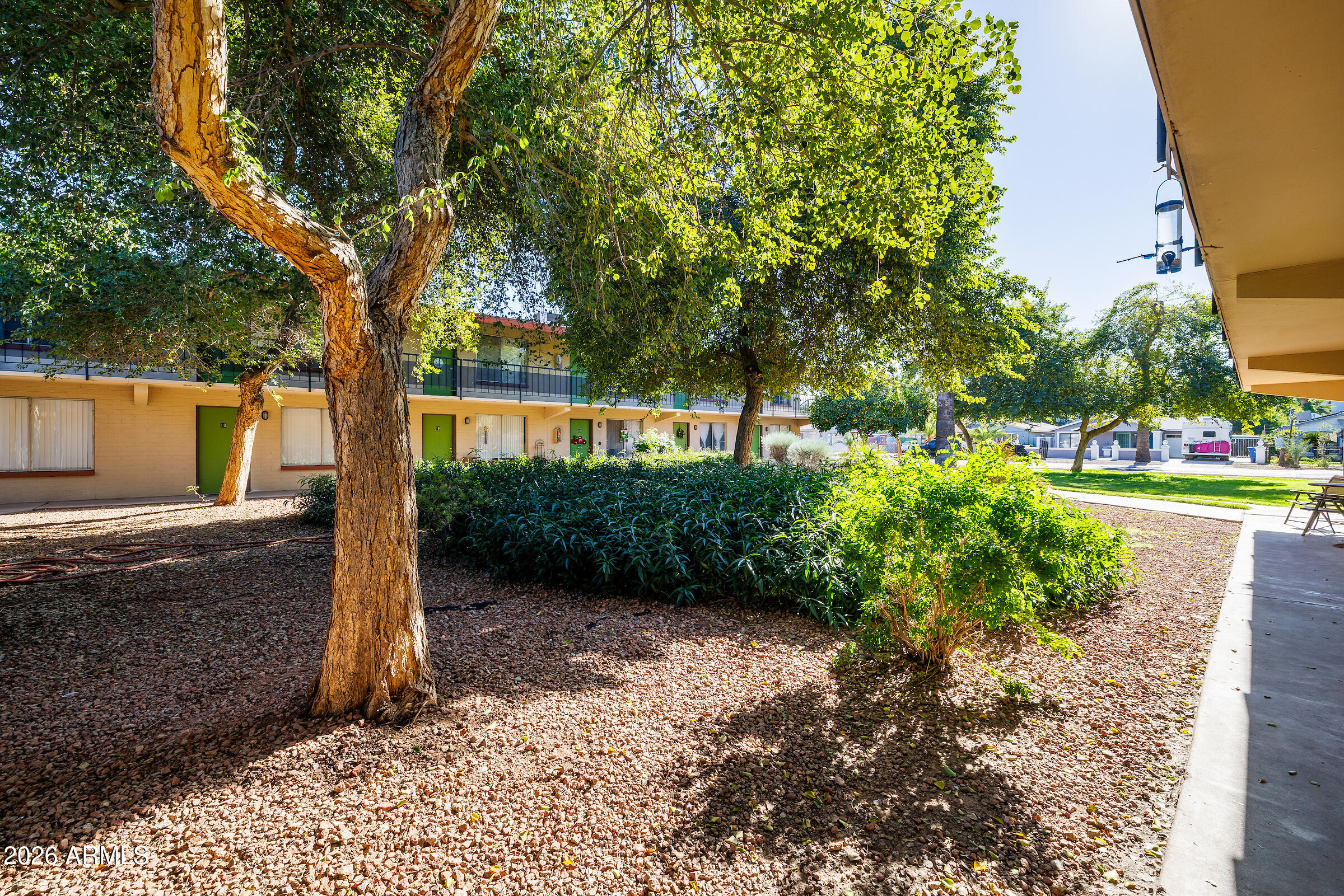 740 East Portland Street Phoenix, AZ 85006 - Photo 11 of 24 a backyard of a house with lots of green space