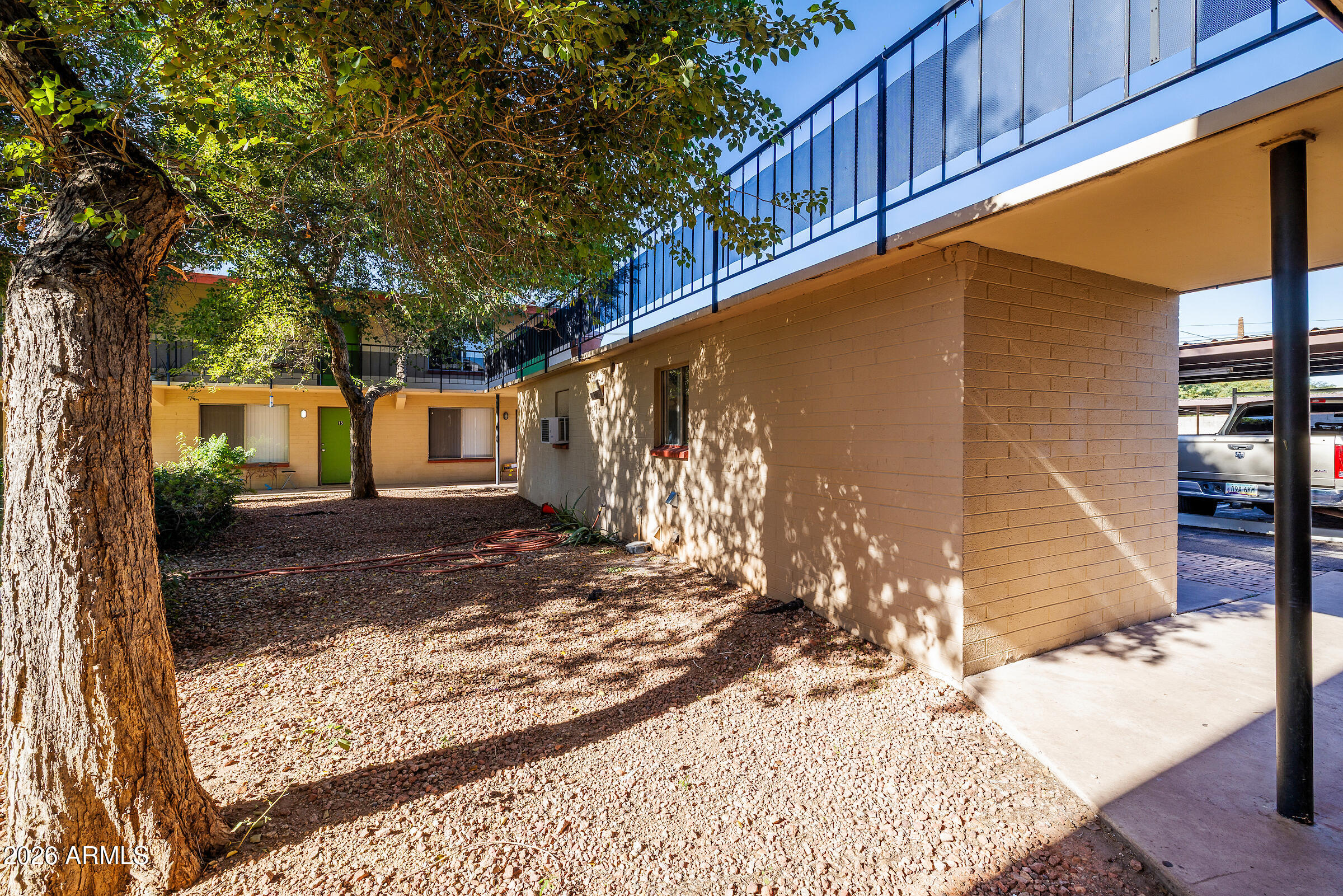 740 East Portland Street Phoenix, AZ 85006 - Photo 12 of 24 a view of a house with a yard