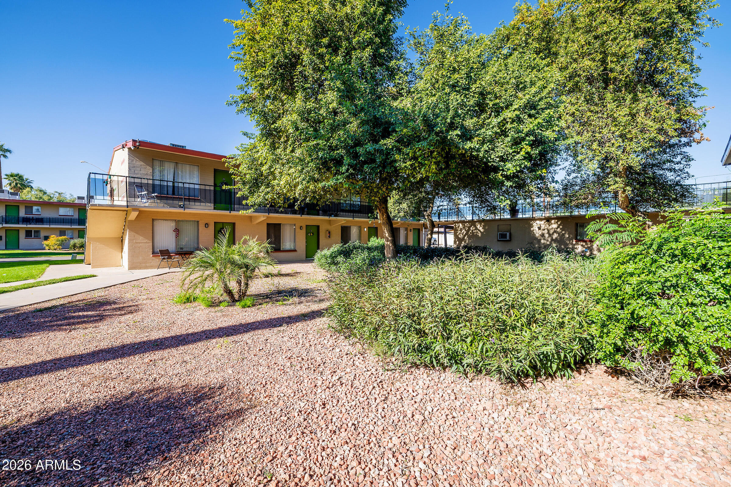 740 East Portland Street Phoenix, AZ 85006 - Photo 17 of 24 a front view of a house with a yard