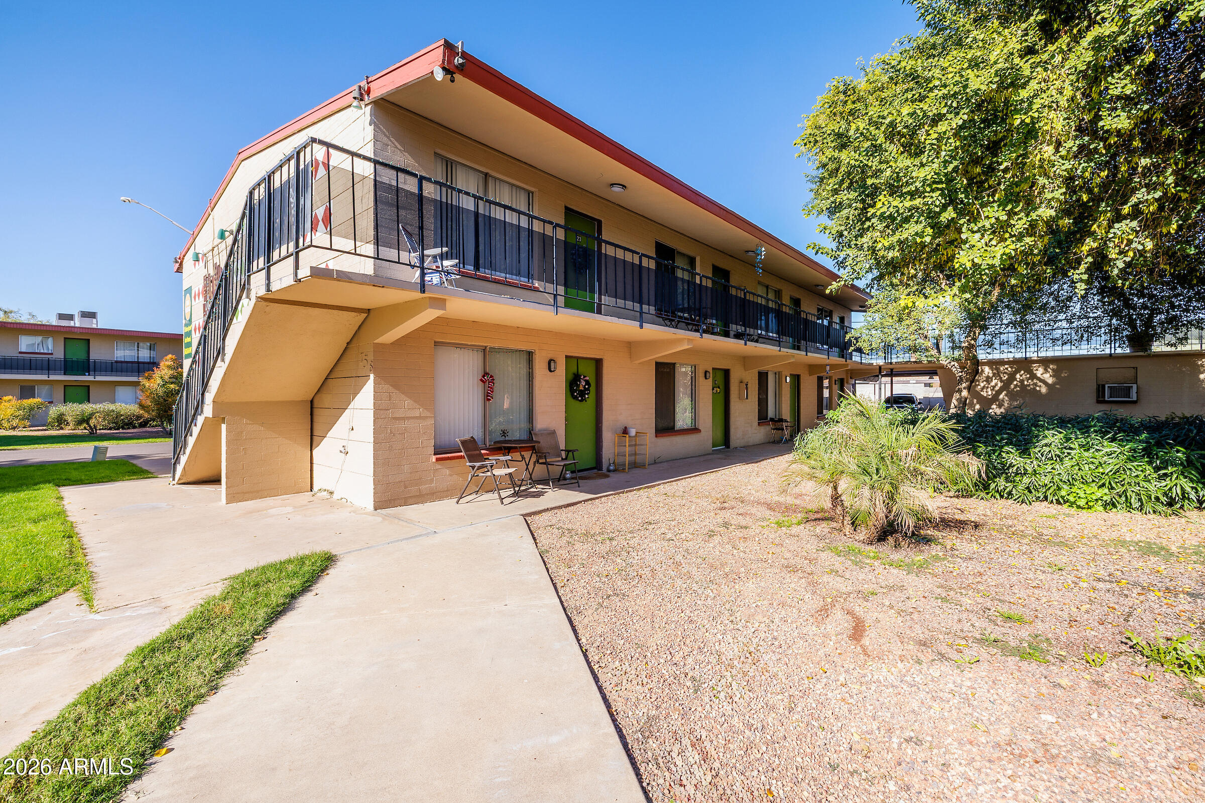 740 East Portland Street Phoenix, AZ 85006 - Photo 18 of 24 a front view of a house with a yard