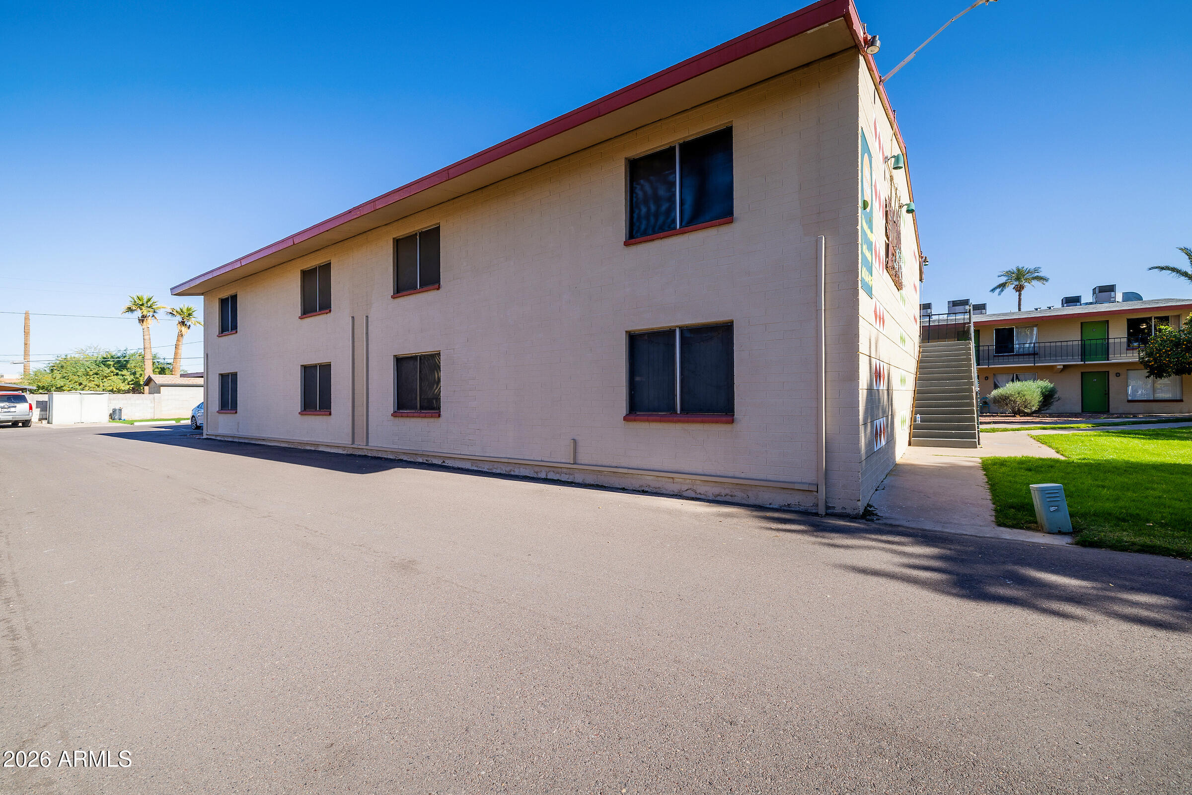 740 East Portland Street Phoenix, AZ 85006 - Photo 6 of 24 a front view of a house with a yard