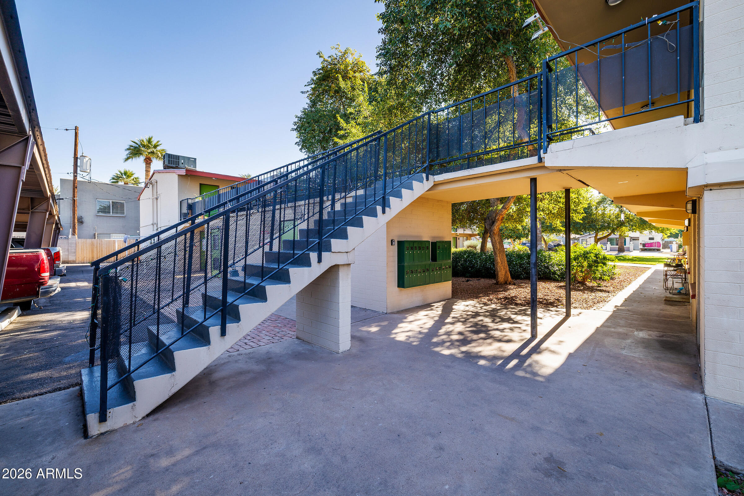 740 East Portland Street Phoenix, AZ 85006 - Photo 8 of 24 a view of swimming pool with outdoor seating and stairs