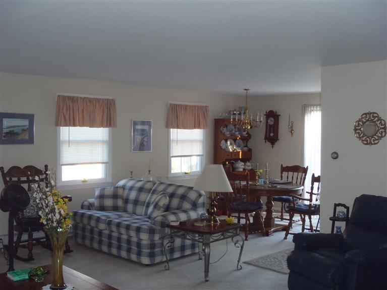 101 Depot Road, Unit 3/C Chatham, MA 02633 - Photo 2 of 13 a living room with furniture and a window