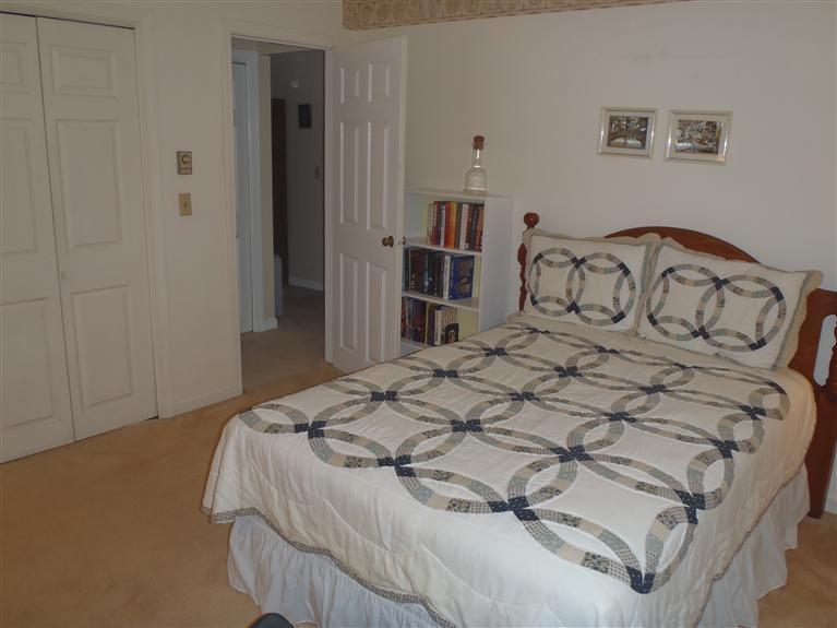 101 Depot Road, Unit 3/C Chatham, MA 02633 - Photo 4 of 13 a bedroom with a bed and a window