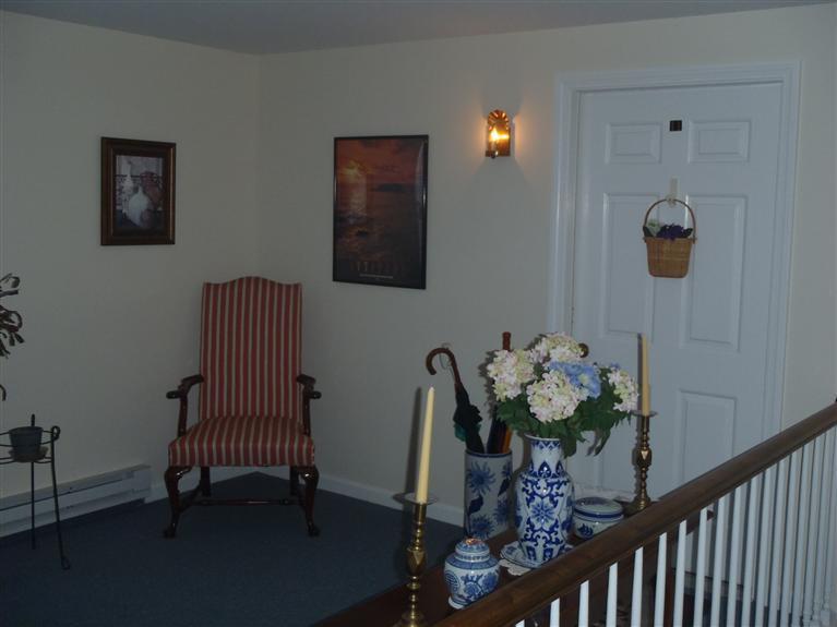 101 Depot Road, Unit 3/C Chatham, MA 02633 - Photo 7 of 13 a dining room with furniture and wooden floor