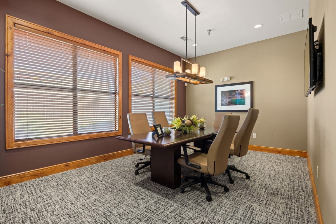 9308 South 1st Beach, Unit 623 Austin, TX 78748 - Photo 21 of 23 a dining room with furniture and window