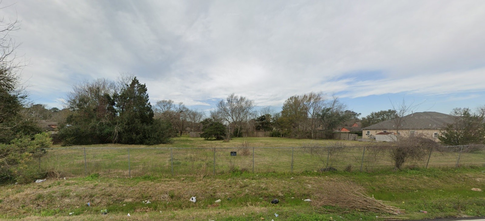 0 Kinney Road Houston, TX 77099 - Photo 4 of 4 a view of a field with trees in the background