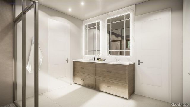 a bathroom with a sink mirror and a bathtub