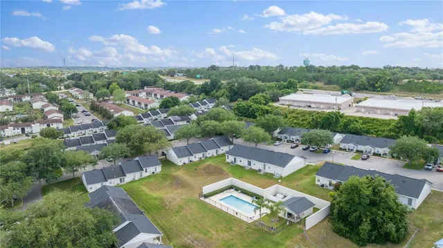 an aerial view of residential house with outdoor space