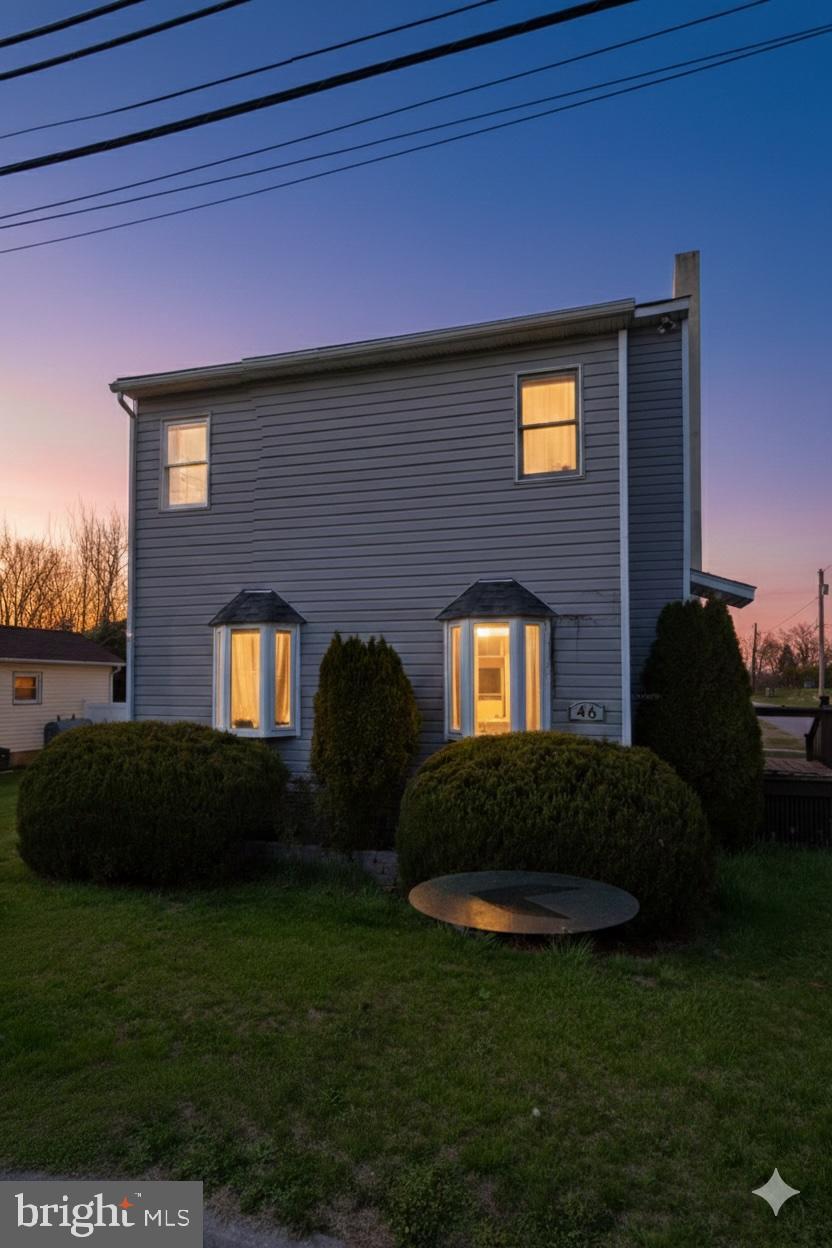 42 Tilbury Road Salem, NJ 08079 - Photo 1 of 10 Charming home aglow at twilight's embrace.