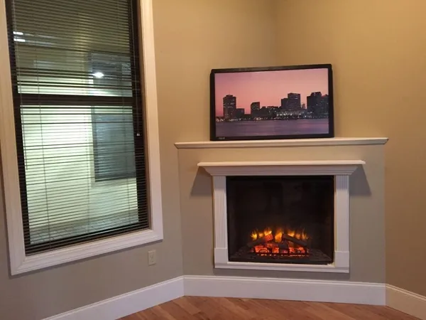 a living room with a fireplace