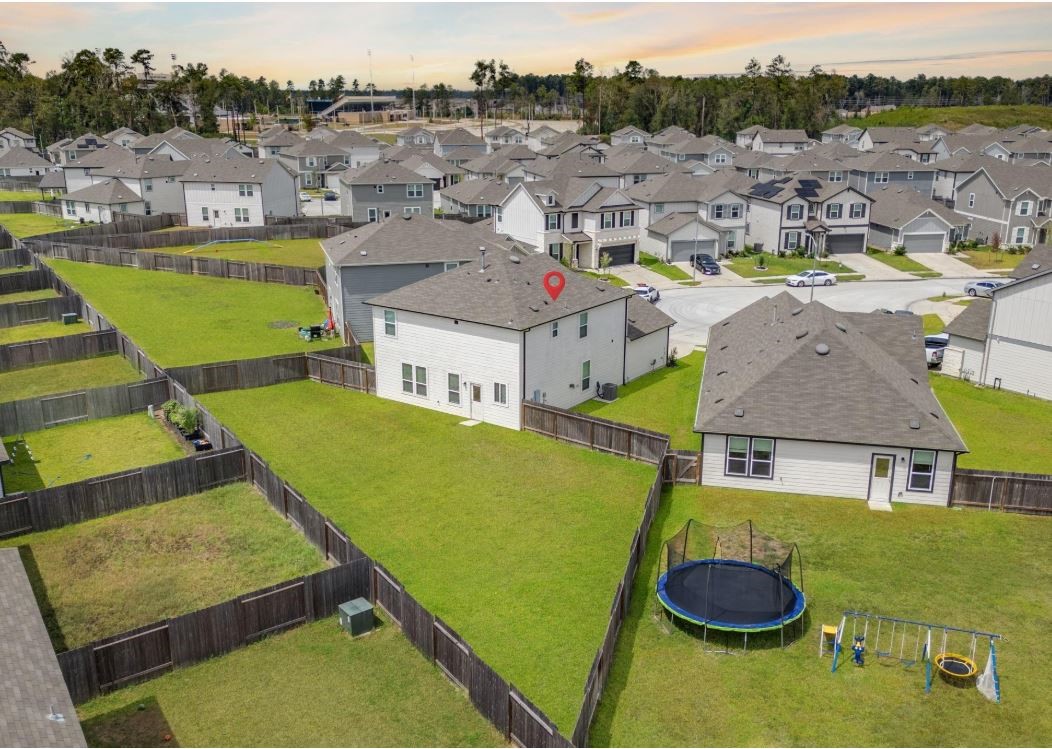 23543 Powmill Street Spring, TX 77373 - Photo 3 of 32 a view of a swimming pool with lounge chairs