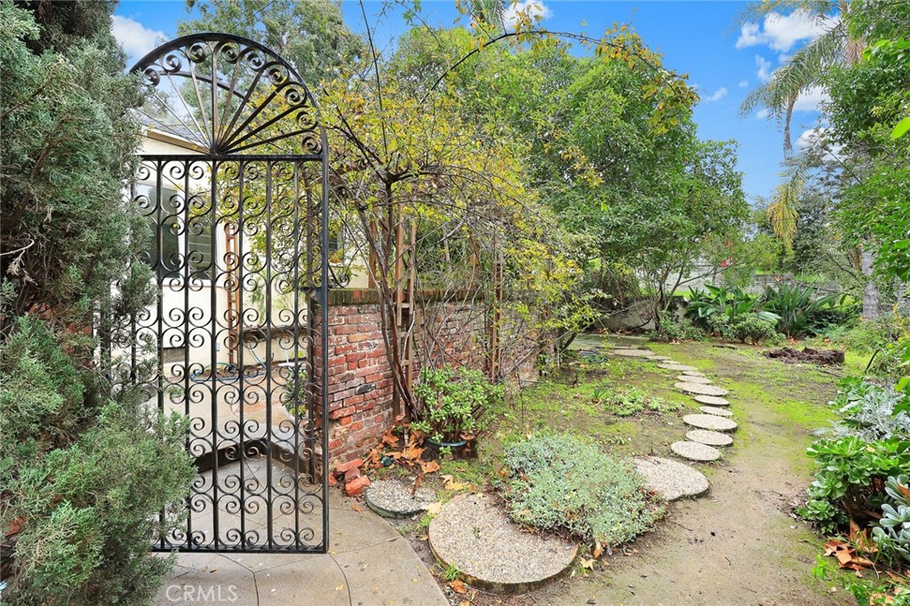 2084 Lilac Lane Glendale, CA 91206 - Photo 1 of 1 a backyard of a house with outdoor seating