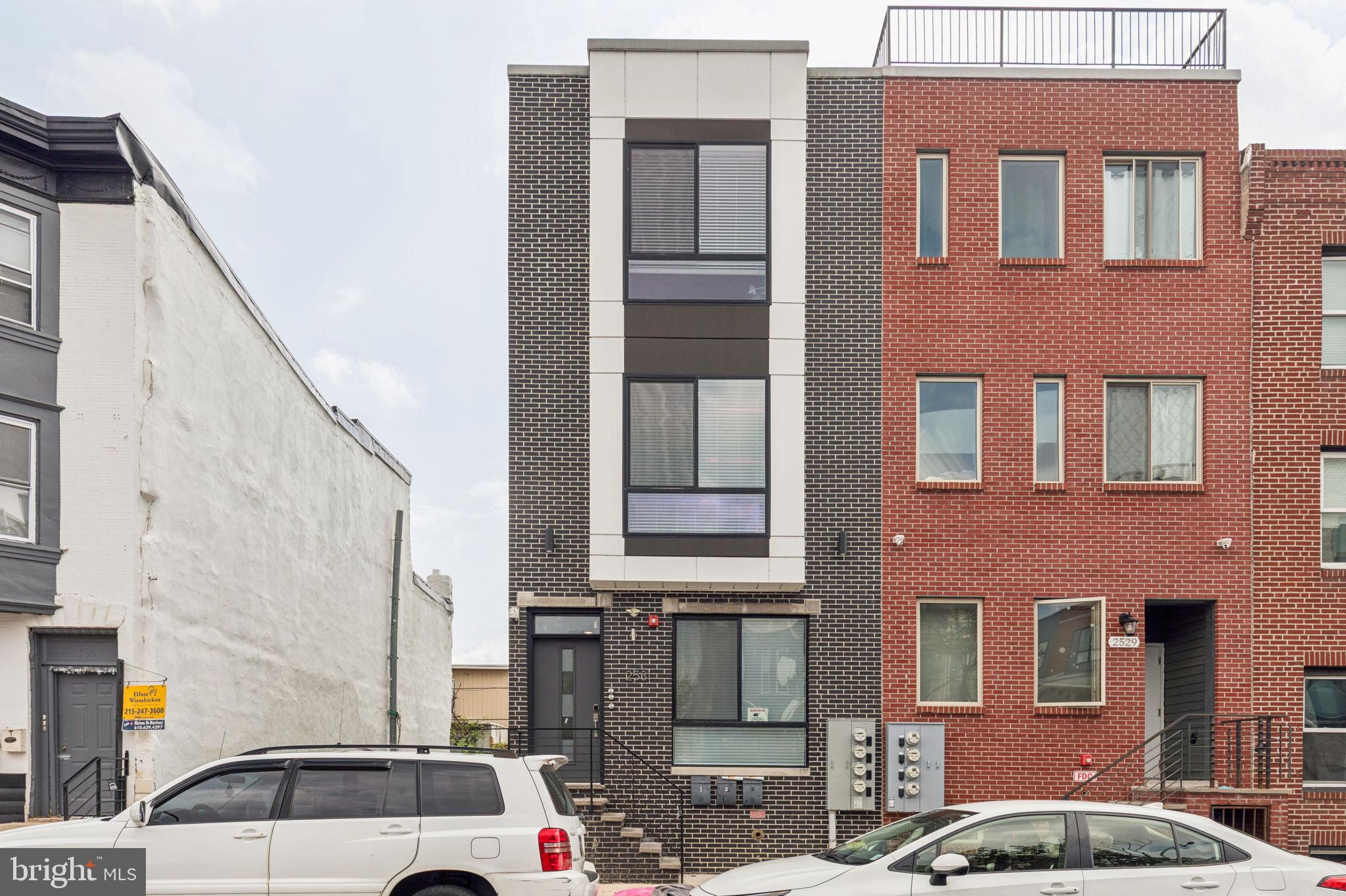 2531 North Front Street, Unit 2 Philadelphia, PA 19133 - Photo 25 of 25 a view of a car park in front of a building