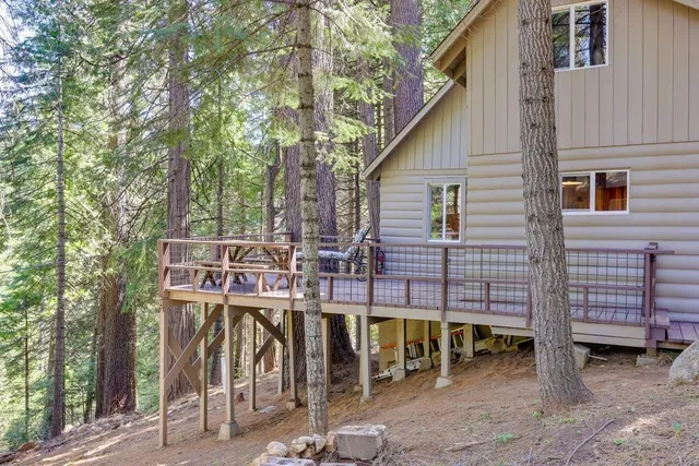 a view of a chairs and table in the patio