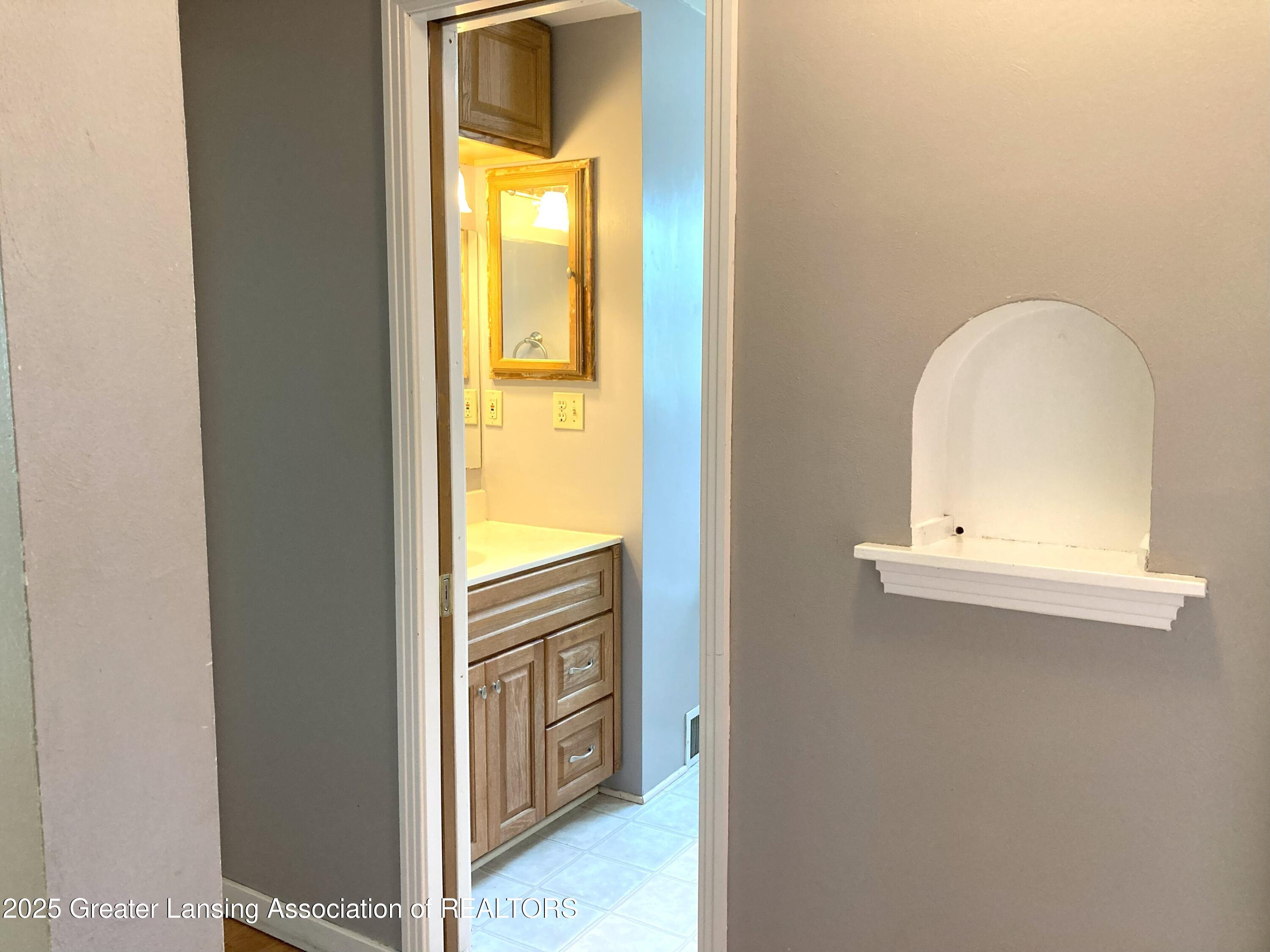 500 Spring Street Grand Ledge, MI 48837 - Photo 17 of 40 17 Hallway to Bedrooms and Bath